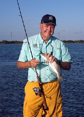 Picture of author with undersized spotted 
	  seatrout