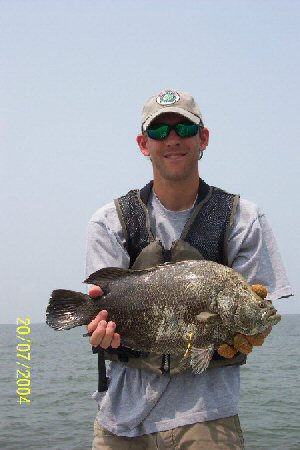 Person Holding Tripletail