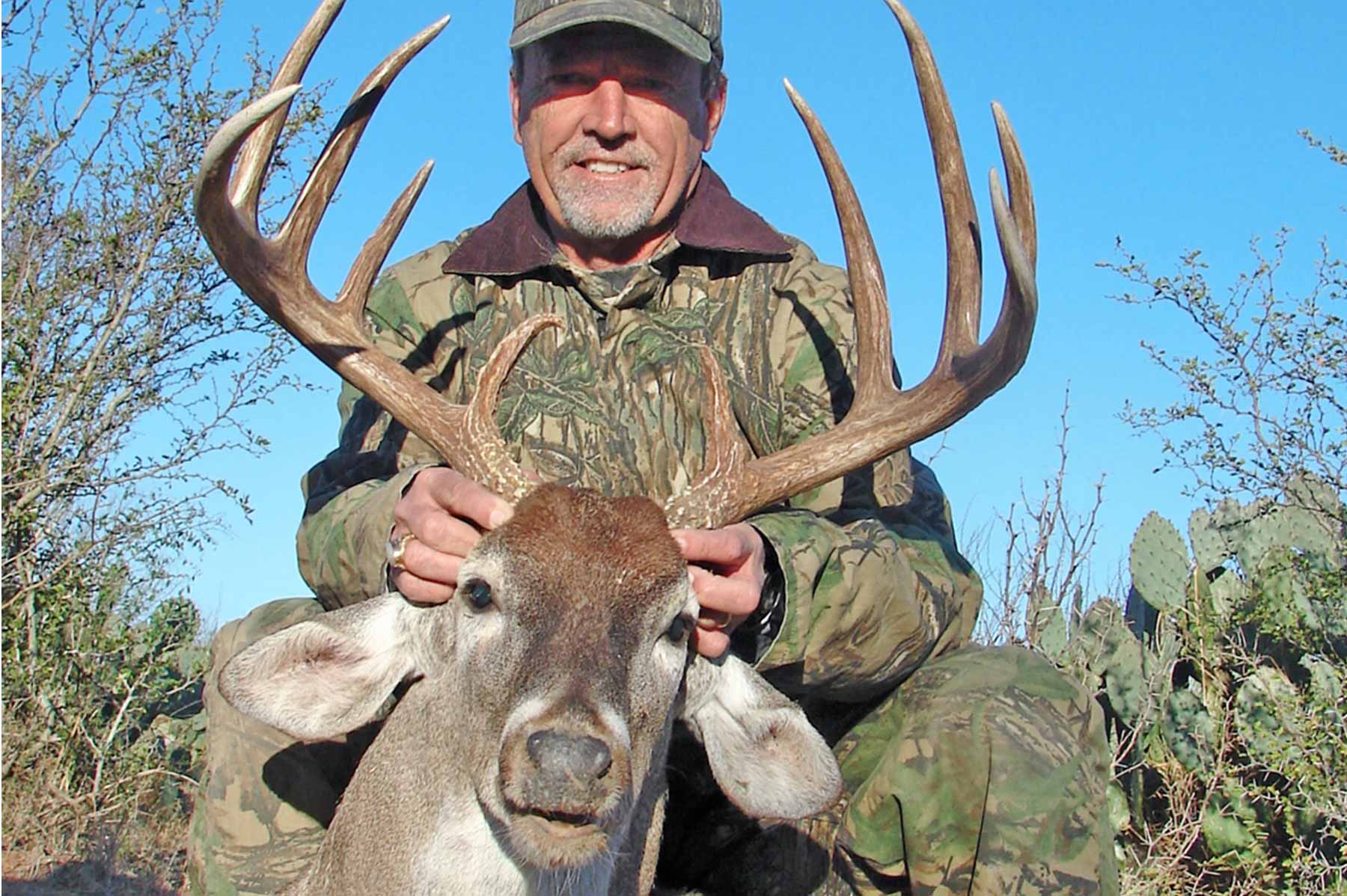 Premium Buck Hunt winner with trophy white-tailed deer