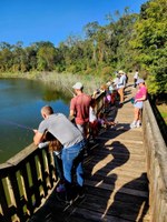 Hale Lake Fishing Visitors join in a Fishing with a Ranger program at Hale Lake Pier