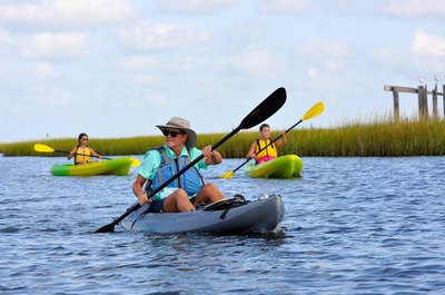 woman paddling a kayak
