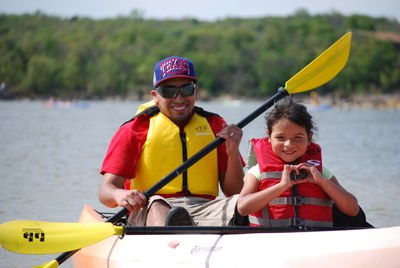 Dad and daughter kayaking