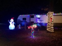 Camper and site with holiday lights
