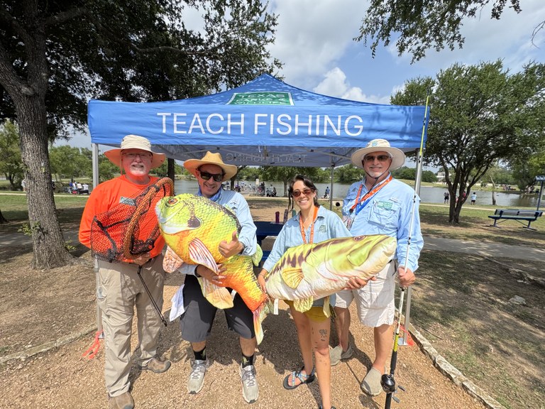 Four Volunteers at Buda Fun Fish event