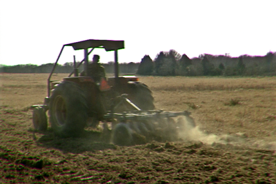 tractor discing field