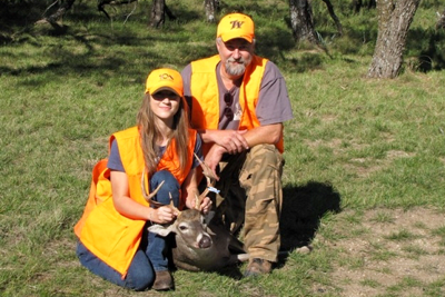 Young hunter with her first deer harvest