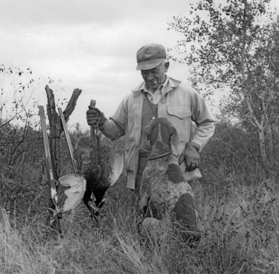 Aldo Leopold hunting with dog