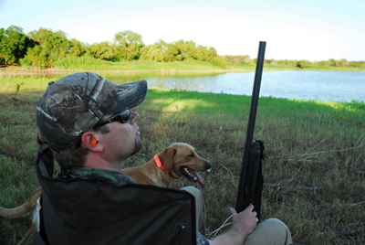 duck hunter with dog