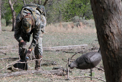 hunter deploying decoys in the water