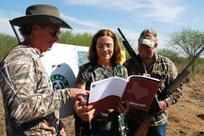 Hunters perusing the Public Lands handbook