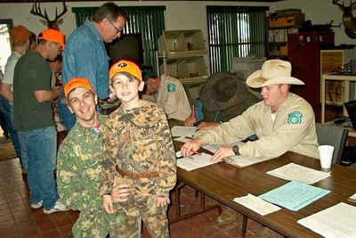 youth hunters checking in at a public hunt