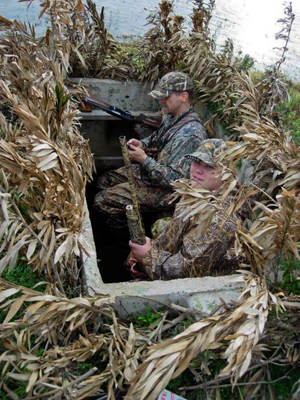 Hunters inside pit blind