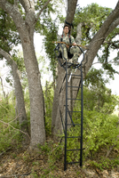 Hunter in tree stand