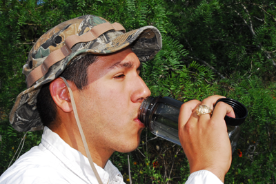 Hunter drinking water