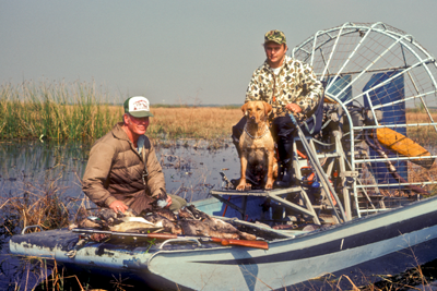 hunters in airboat