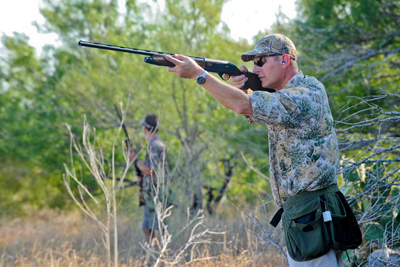 dove hunter aiming