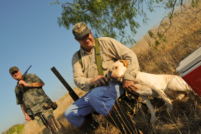 hunters with dog