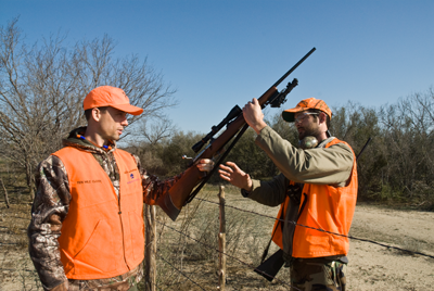 firearm hand-off at fence crossing