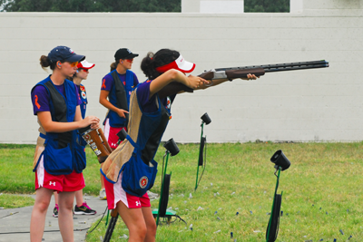 High School students practice shooting shotguns