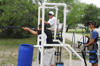 Youth at shotgun practice shooting range