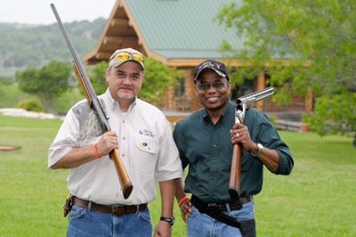 men with shotguns