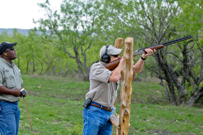 Gov. Perry taking aim with shotgun