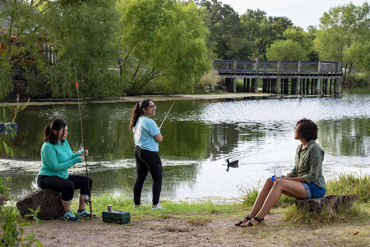 Ladies fishing in Neighborhood Fishin' location