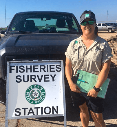 Biologist conducting creel survey