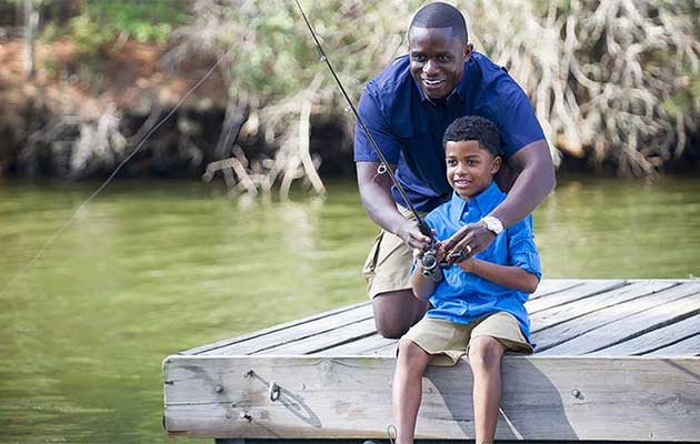 Father and son fishing on Lake Bastrop