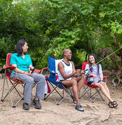 Women fishing in Mc Kinney Falls State Park