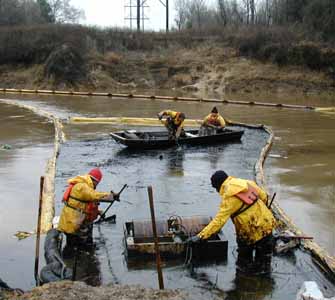 spill on Sabine River with containment booms