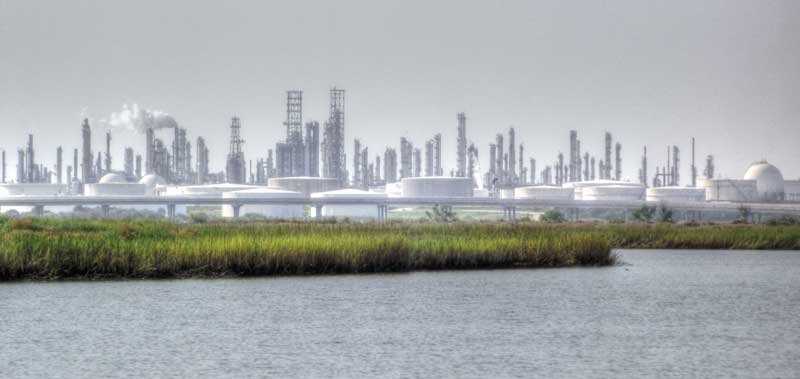 Oil and gas refinery on Texas coast, an image in Texas Aquatic Science by author Rudolph Rosen