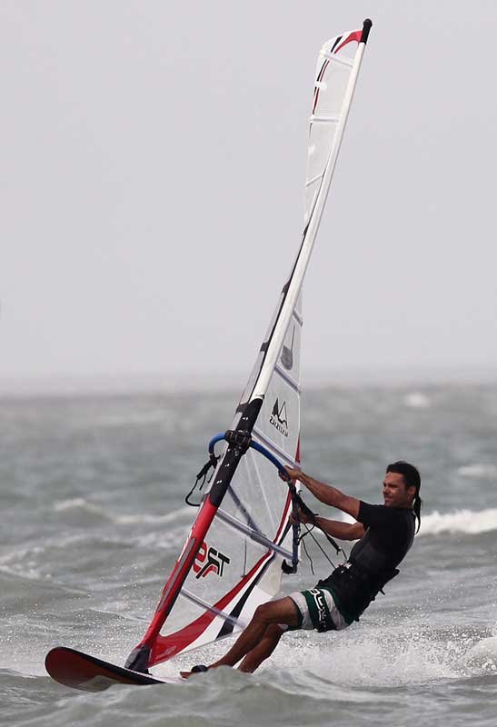 Windsurfer windsurfing, an image in Texas Aquatic Science by author Rudolph Rosen