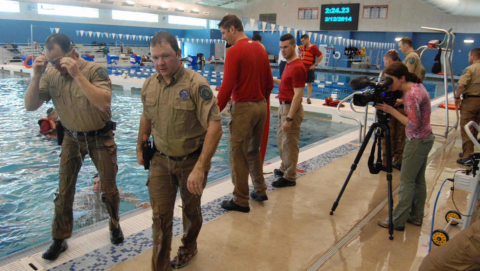 Whitney Bishop videotapes wet wardens taking a water safety training course.