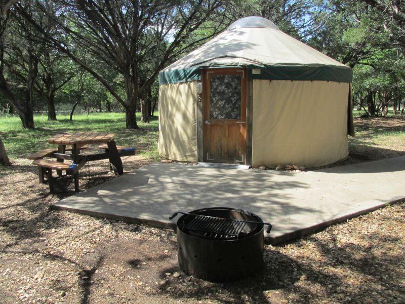 Yurt #2 has a concrete sidewalk and patio.