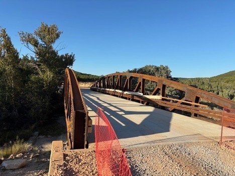 Bridge with metal railing.