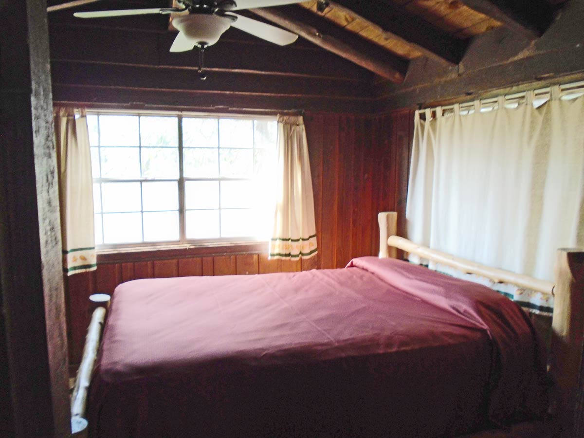 There is a double bed in both bedrooms of Cabin 10.