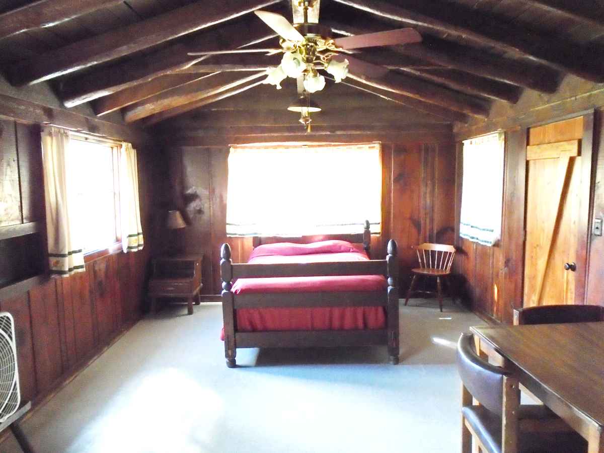 Cabin 11 has a double bed in the living area.