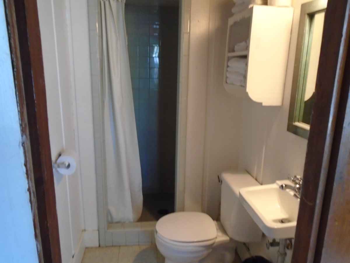 The bathroom in Cabin 11 has a shower. 