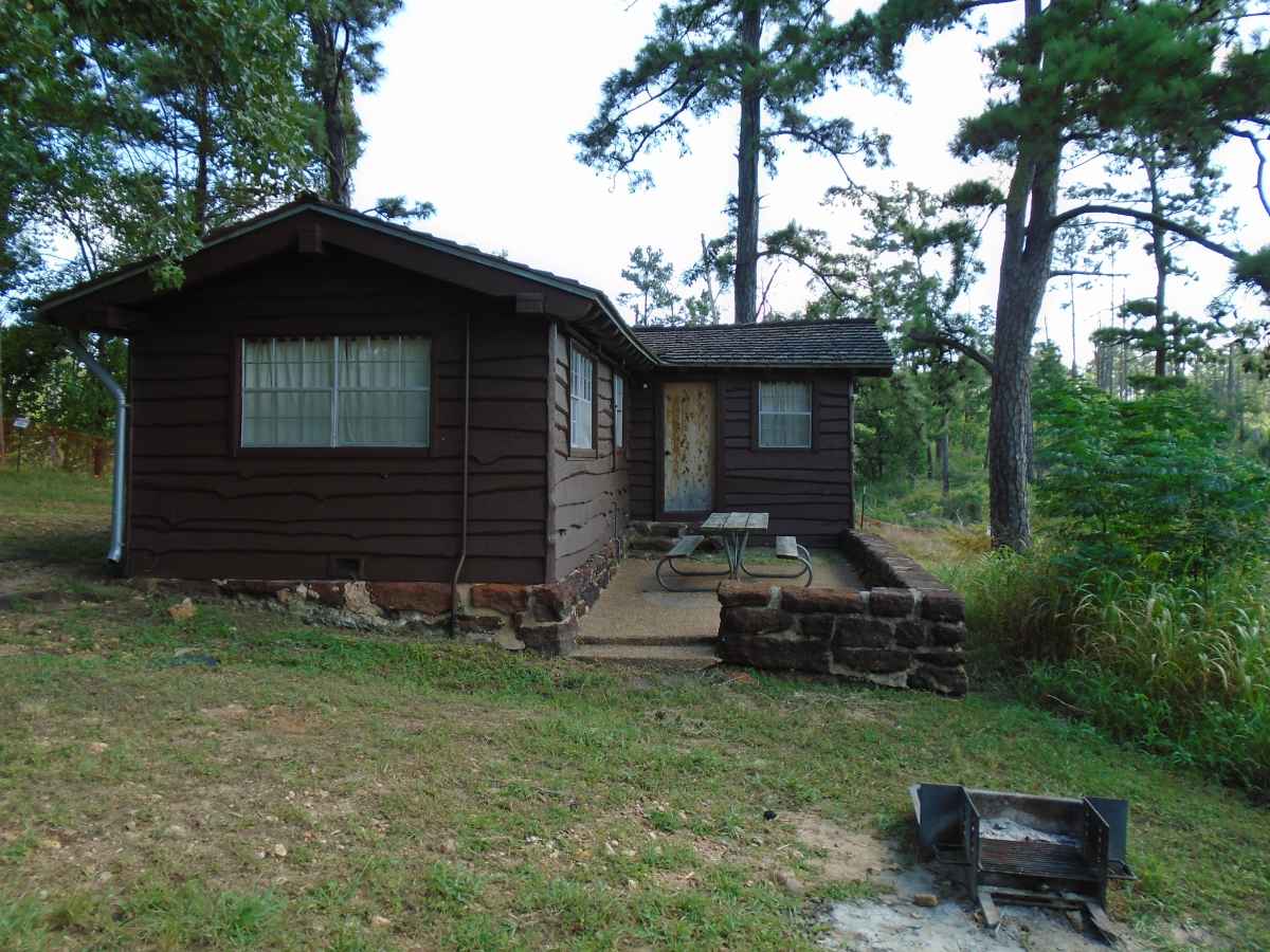 Cabin 11 had an outside  picnic table and a fire ring in the back.  