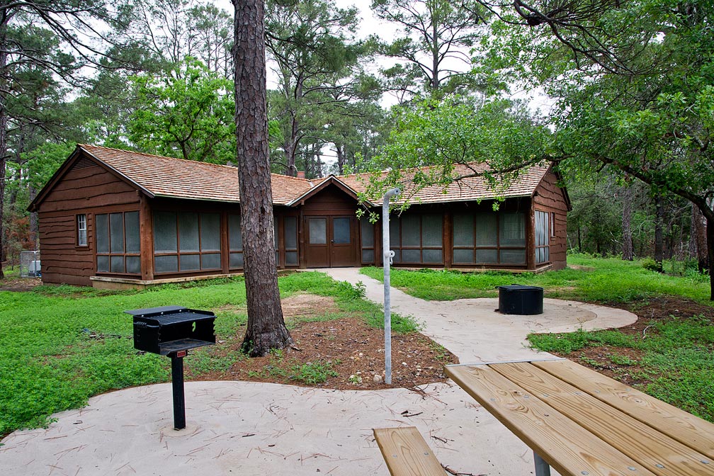 Cabin #12 has a huge back screened-in porch. This is an older picture. 