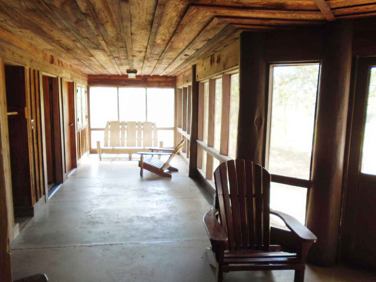 Another view of the huge, back screened-in porch of Cabin 12.