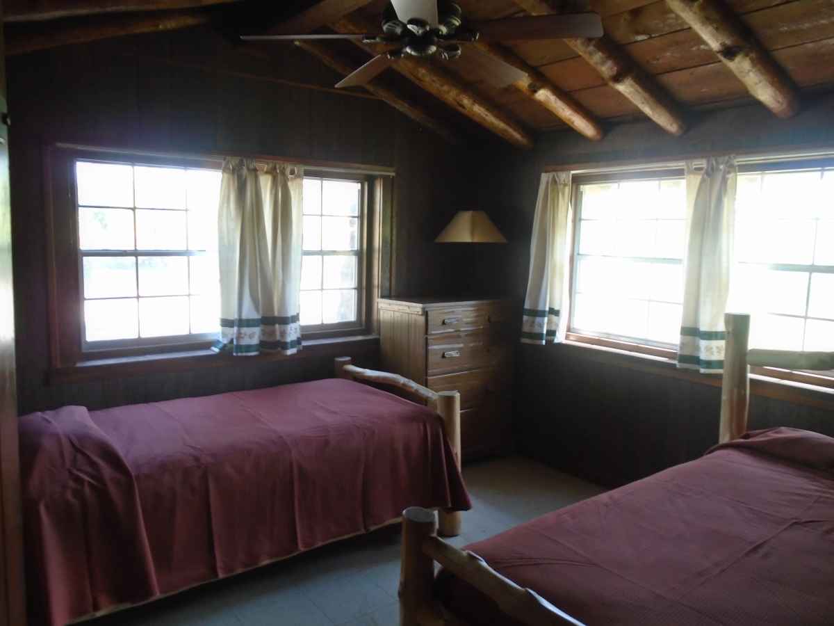Bedroom 2 in Cabin 14 has two single beds.  