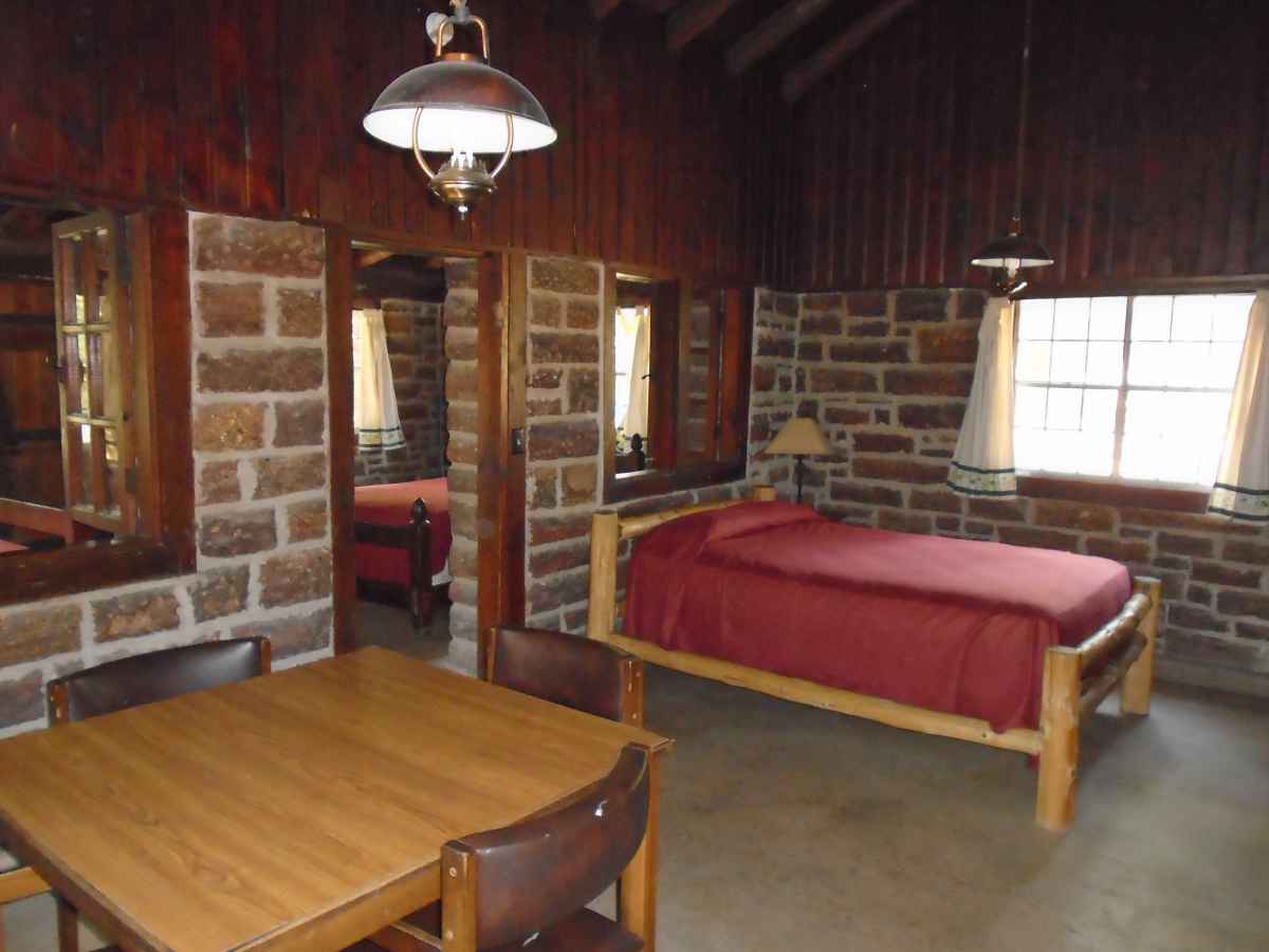 There is a double bed inside the Living/Lounge area of Cabin #3.