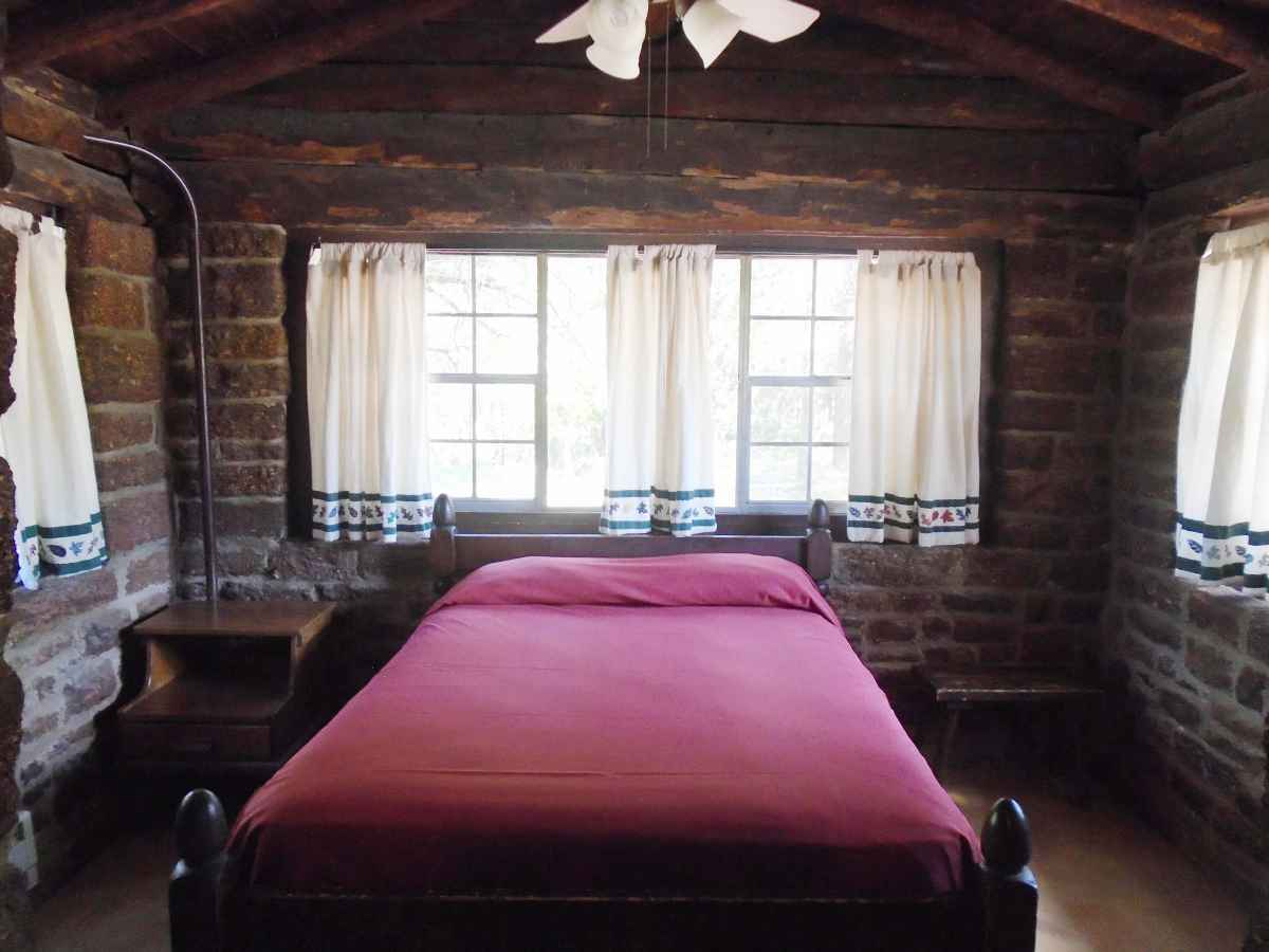 The main bedroom of Cabin 4 has a double bed. 