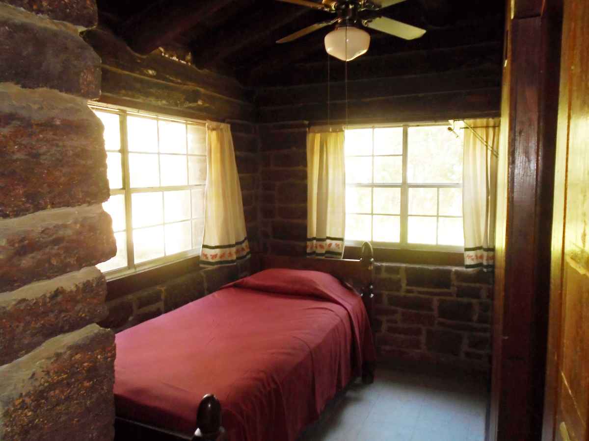 Bedroom 2 of Cabin 5 has a single bed.