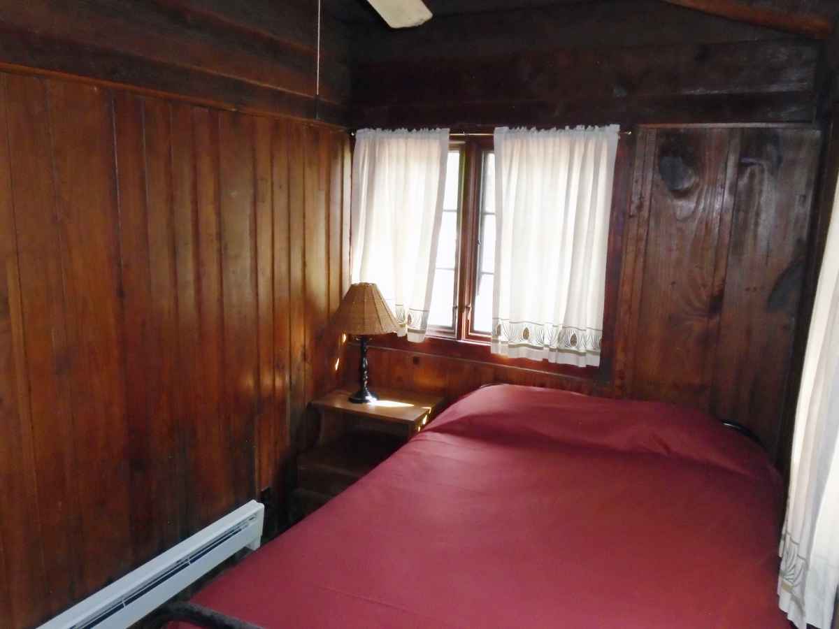 The two bedrooms of Cabin 6 each have one double bed. 