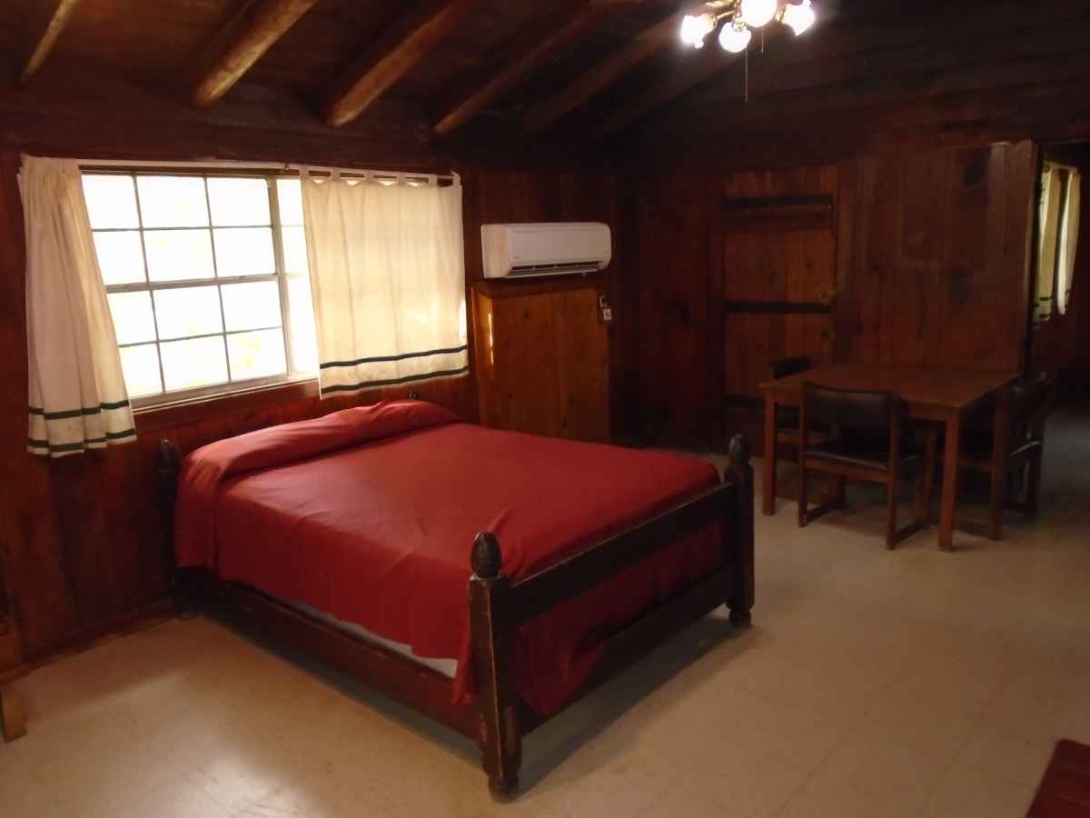 The living area of Cabin 7 has one double bed. 