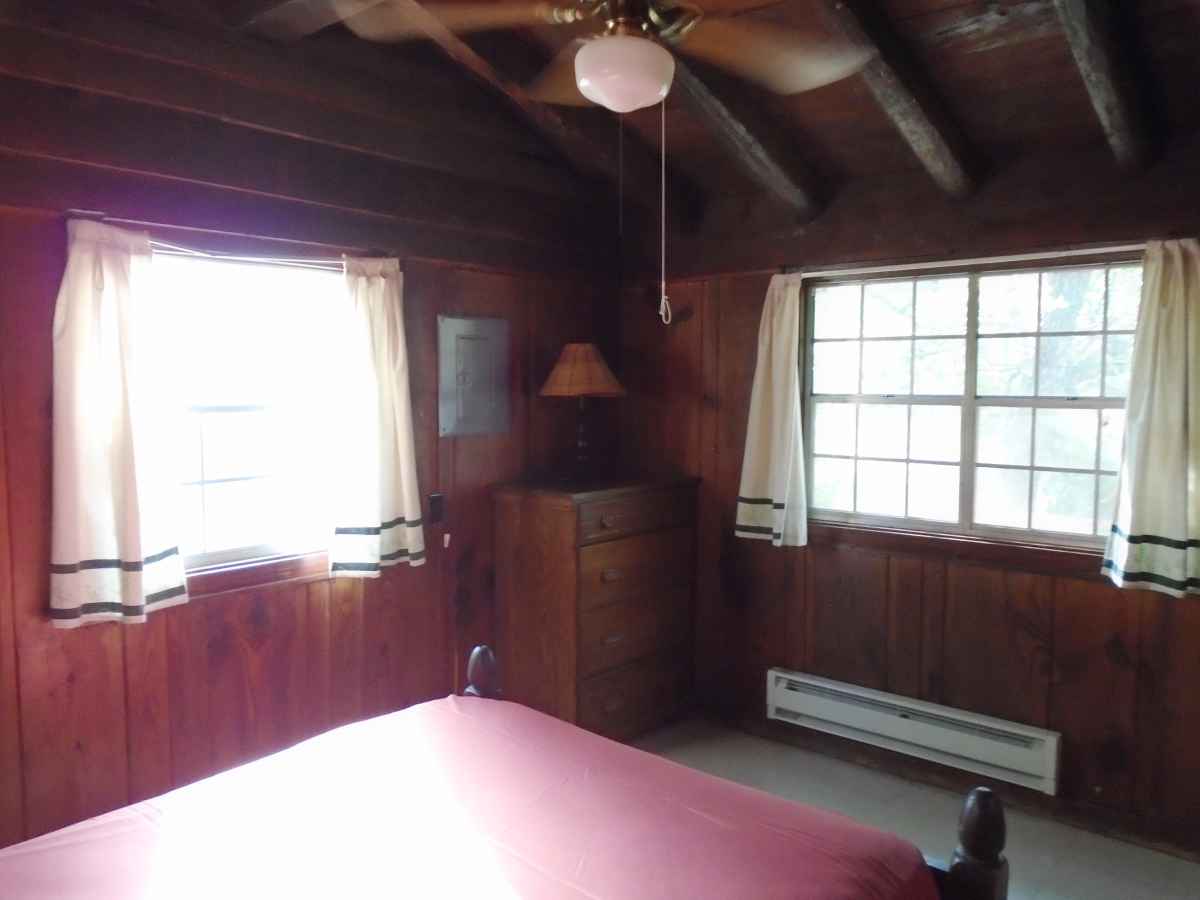 Bedroom 2 of Cabin 7 has one single bed.