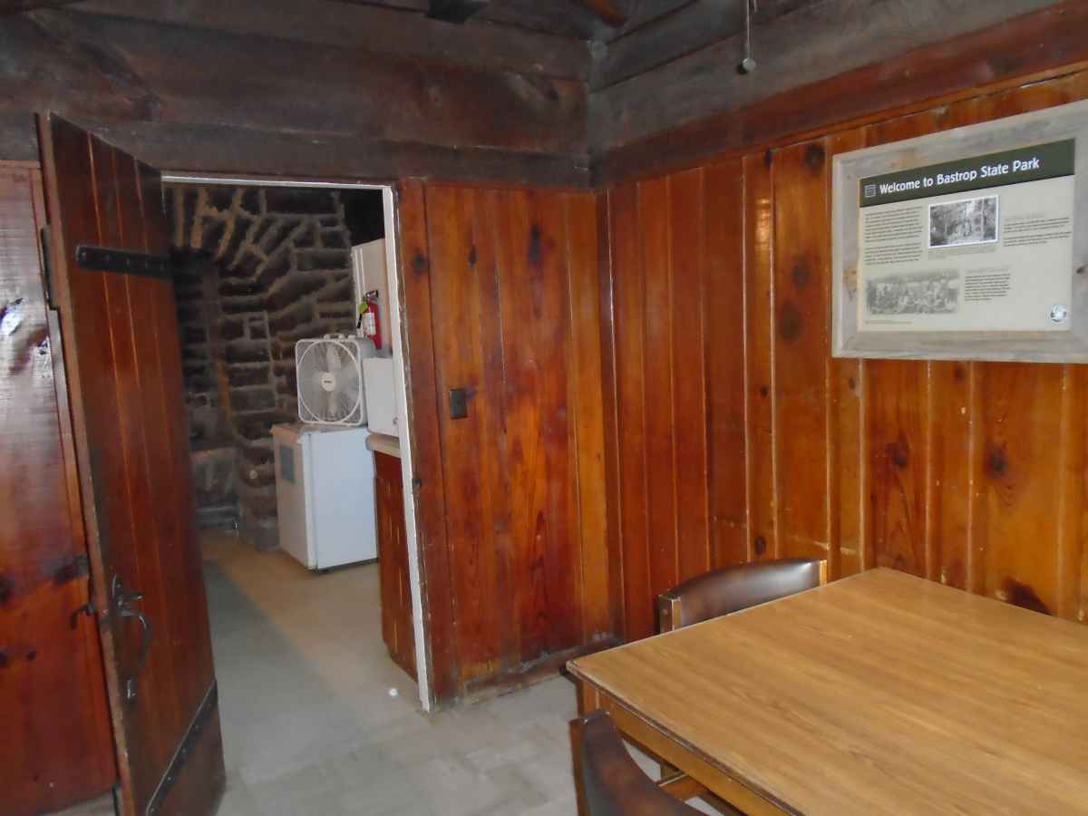 A view of part of the dining area and kitchen in Cabin 9. 